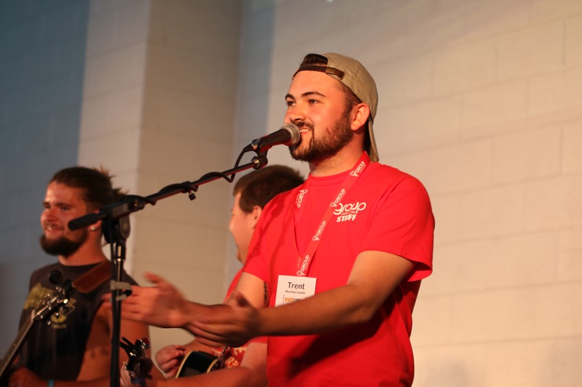 Employee leading worship