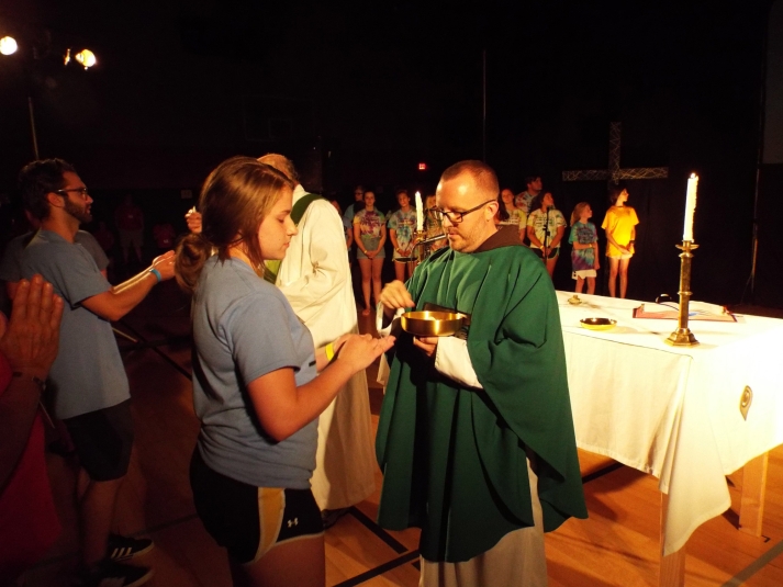 girl receiving communion
